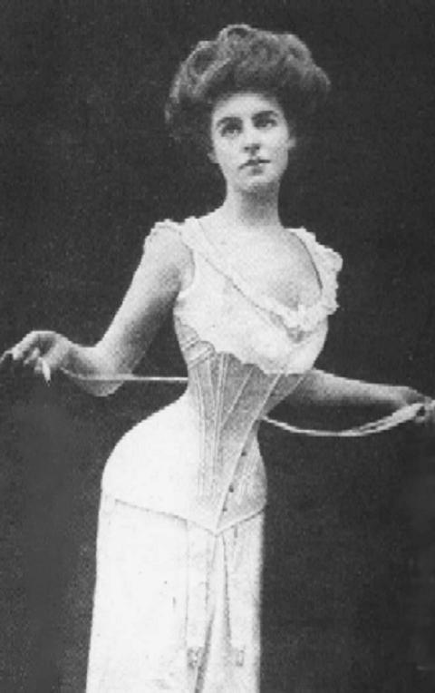 A black and white photo of a woman in a corset. A black and white photo of a woman in a corset.
